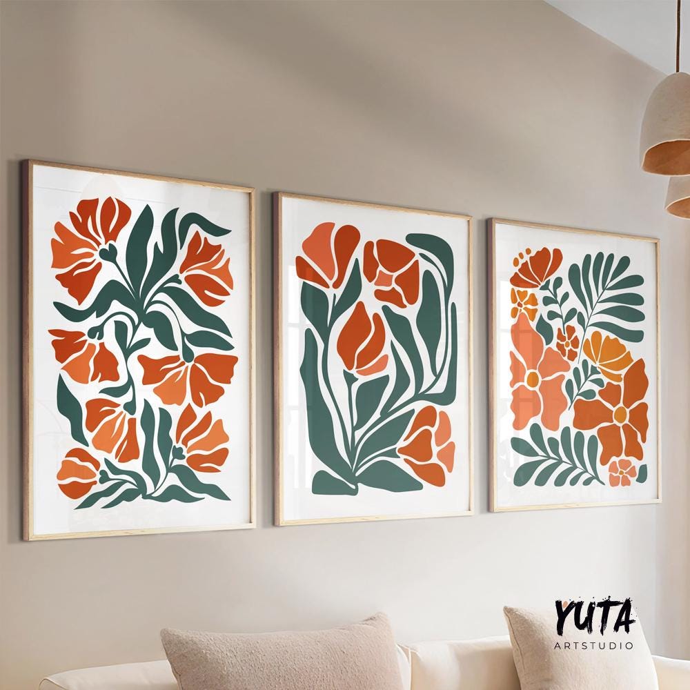 Abstract botanical prints in warm terracotta tones framed as a three-piece wall set
