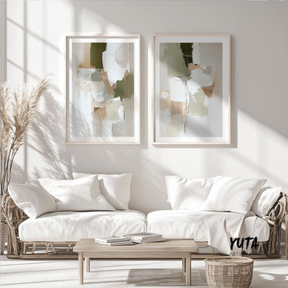 Abstract brushstroke wall art set of two in light wood frames shown above sofa for scale