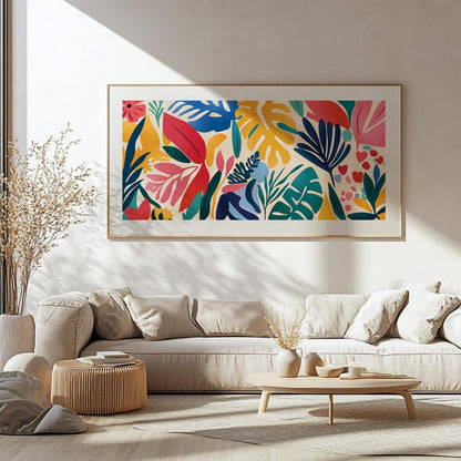 Framed abstract tropical leaves artwork in bold Matisse style above a minimalist console.