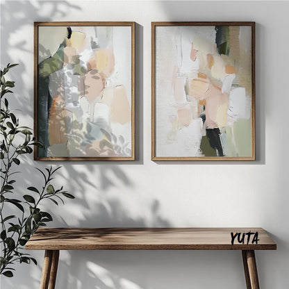 Abstract pastel brushstroke paintings in wood frames, arranged as a two-piece gallery above a console.