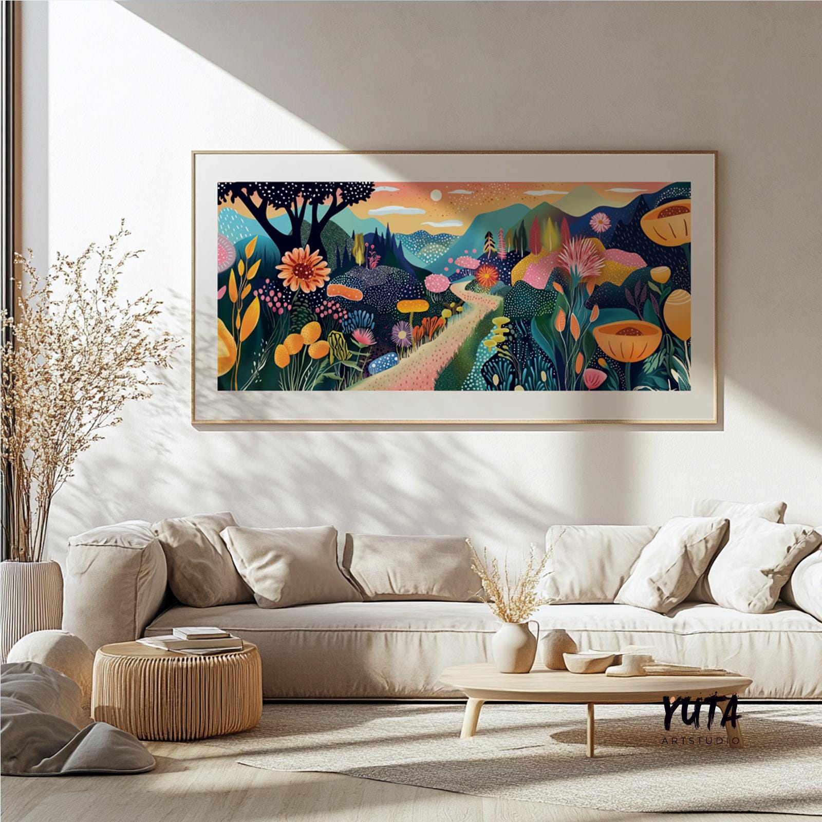 Botanical landscape artwork in a modern frame displayed above a beige sectional sofa
