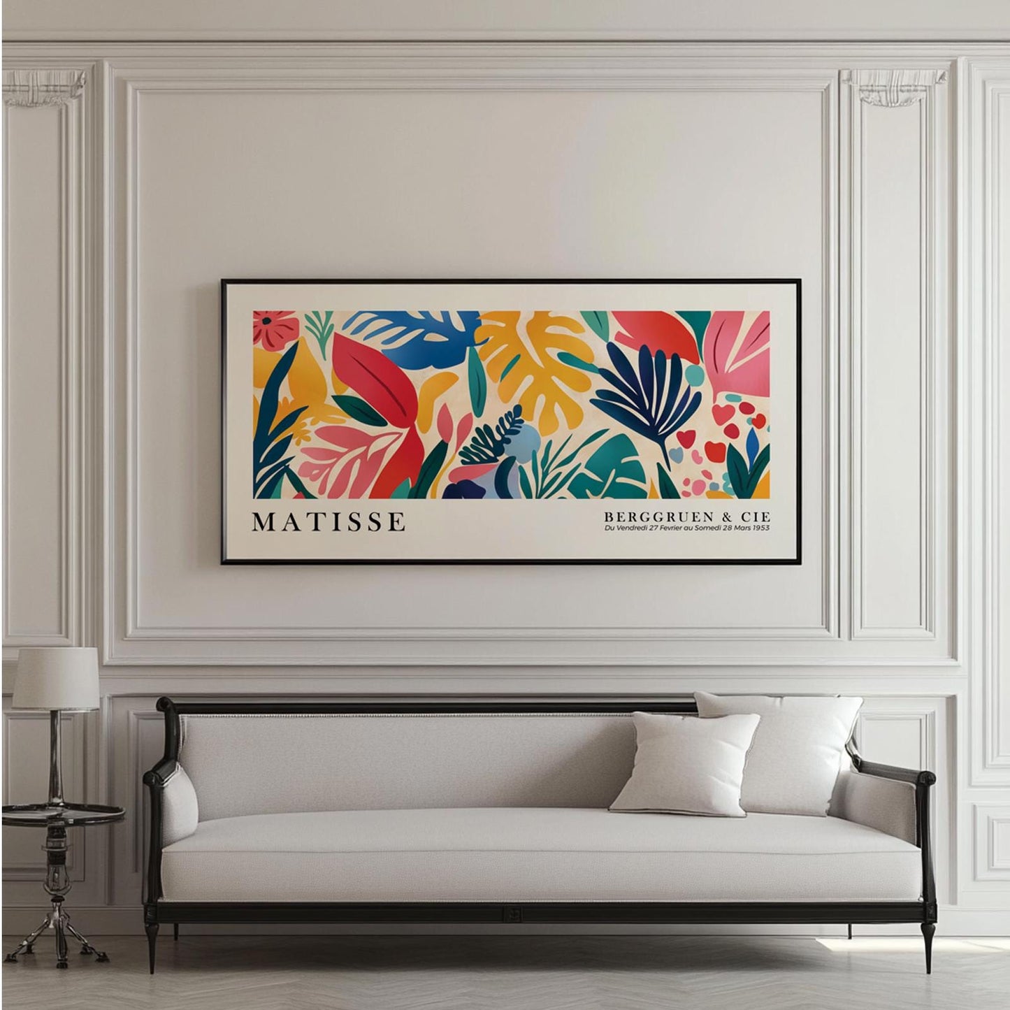 Oversized panoramic Matisse print with bold tropical leaves shown above a modern sofa for scale