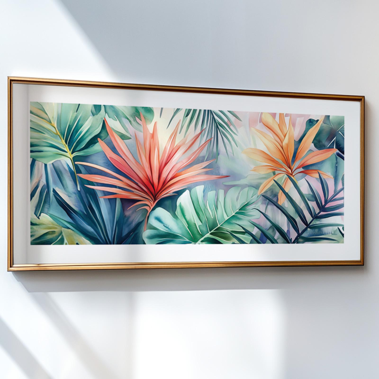 Tropical leaves watercolor artwork in a gold frame, hung on a bright white wall