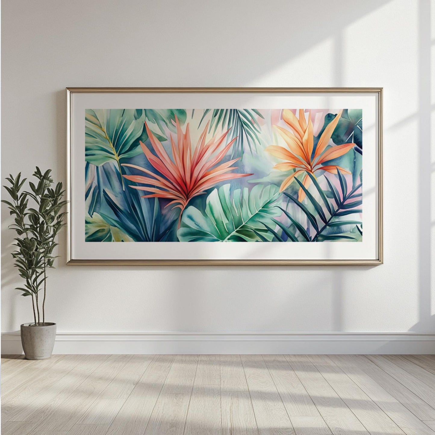 Framed panoramic artwork with watercolor tropical leaves displayed on a sunlit wall