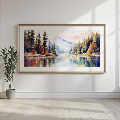 Watercolor mountain landscape in a gold frame, wall mounted with sunlight streaming in