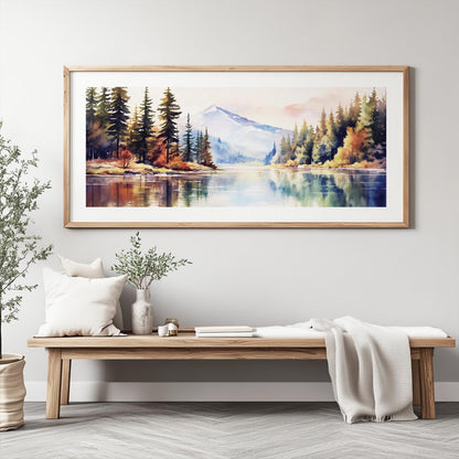 Panoramic watercolor mountain landscape in a light wood frame above a minimalist bench