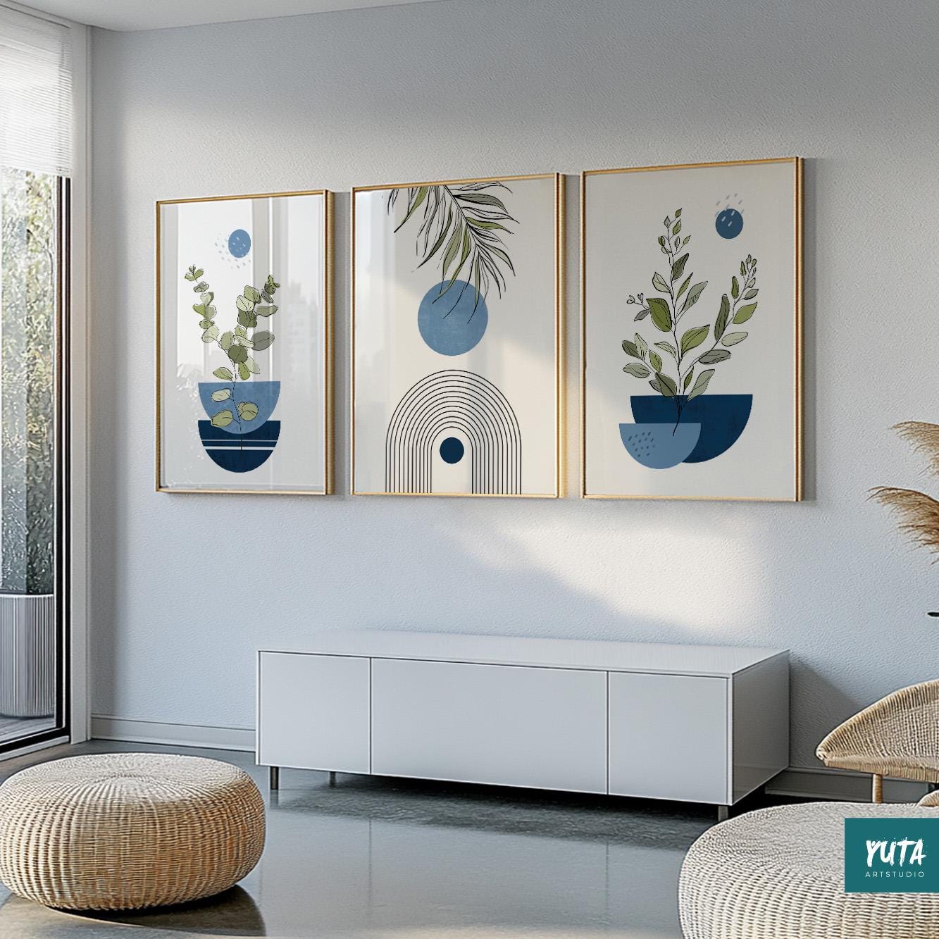 Framed navy blue abstract print set displayed above a low white console for size reference