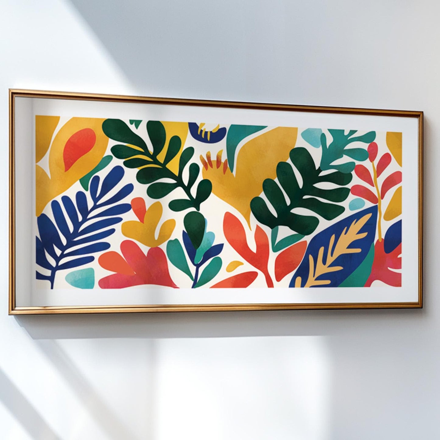 Framed Matisse-style botanical print with bold, colorful leaves above a light console.