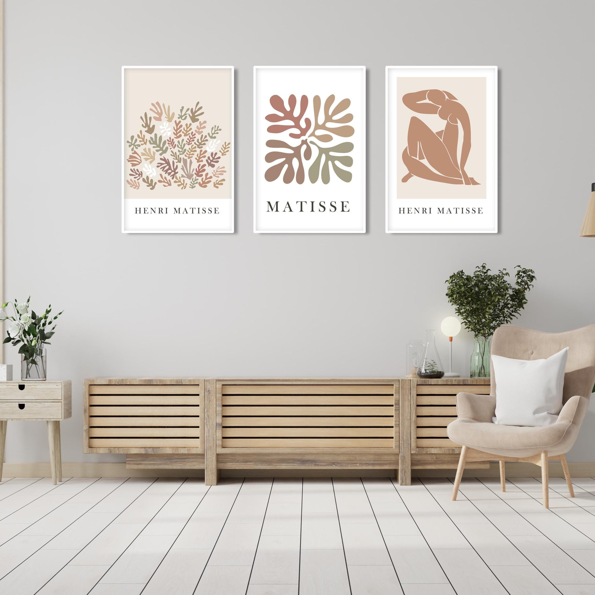 Three framed neutral Matisse prints in 20x28 inch sizes displayed side by side above a wooden sideboard.