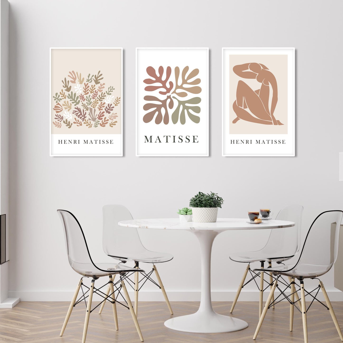 Abstract Matisse-inspired prints in beige tones, framed as a three-piece art set above a dining table.