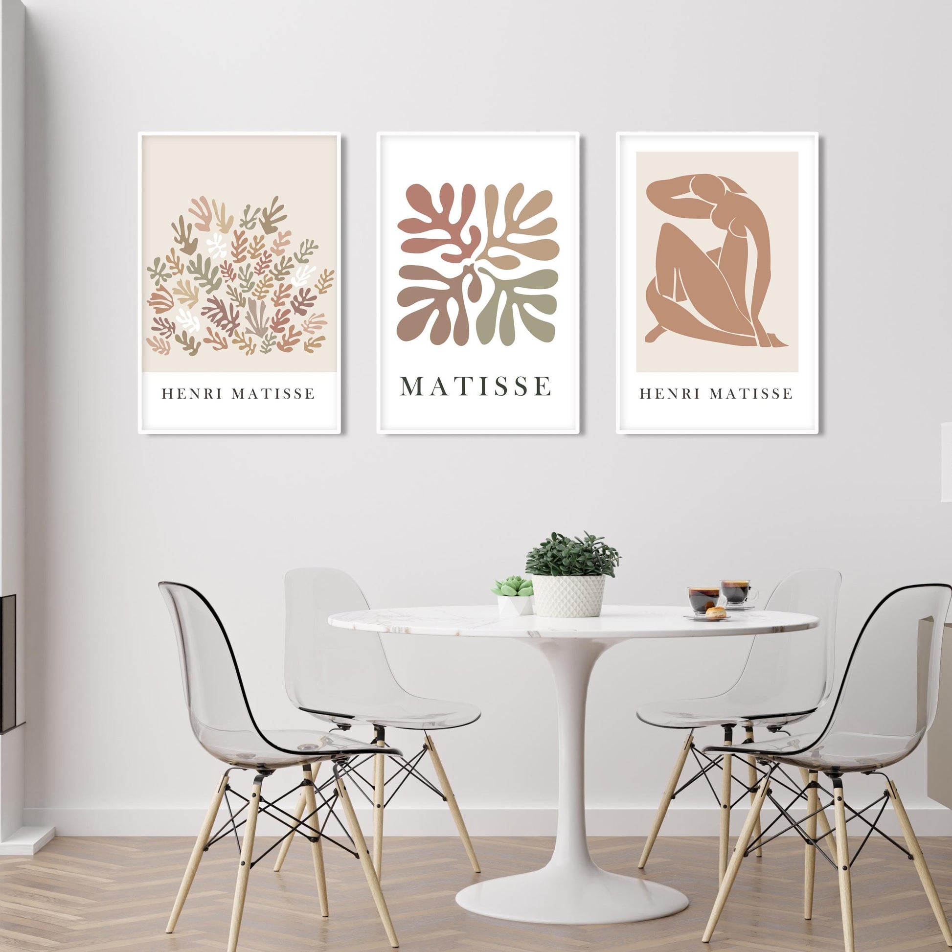Abstract Matisse-inspired prints in beige tones, framed as a three-piece art set above a dining table.