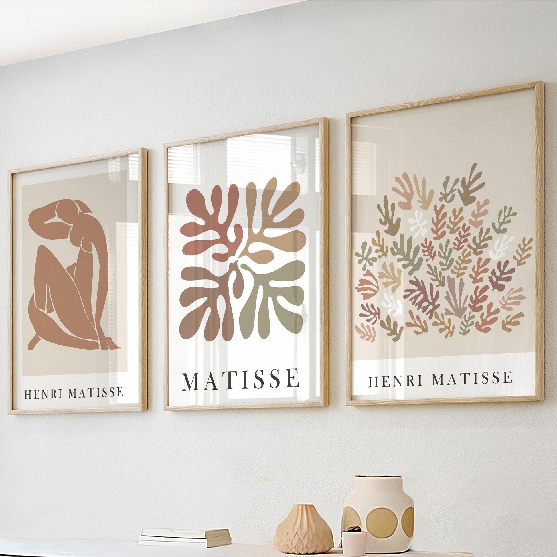 Framed Matisse print trio shown in common sizes for a neutral gallery wall arrangement