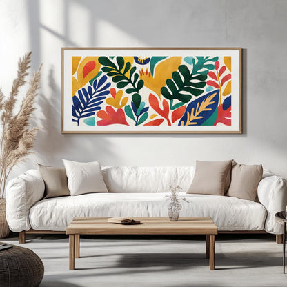 Colorful botanical wall art with abstract leaves in a light wood frame above a white sofa