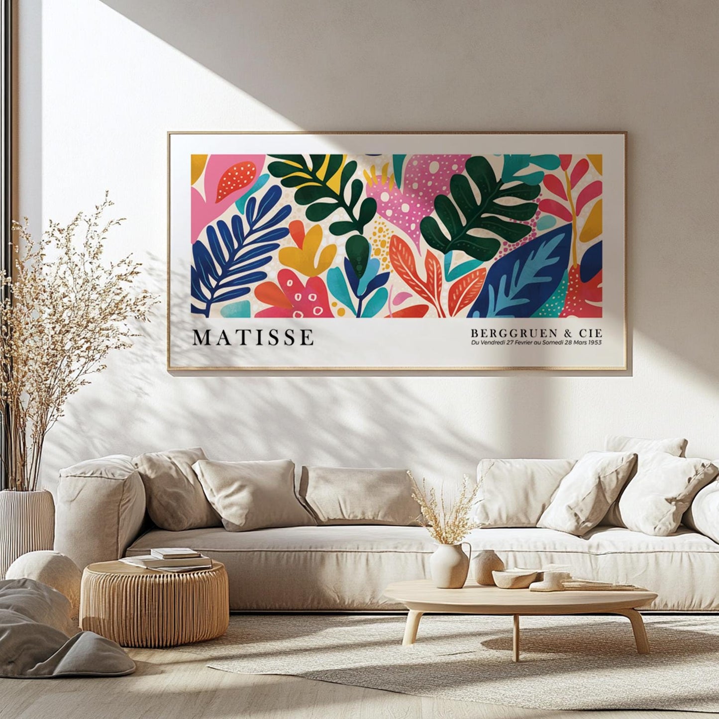 Colorful leaf abstract in modern wood frame, centered above a neutral sofa setup
