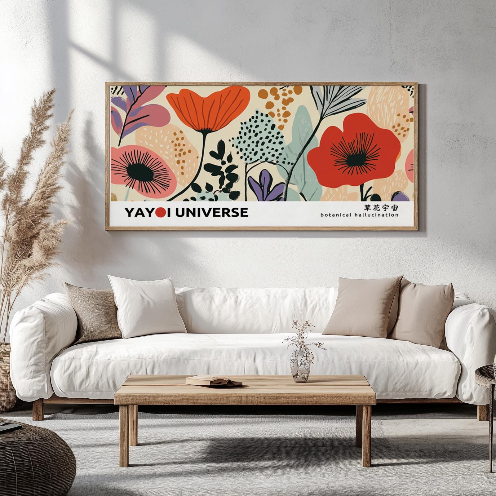 Large framed abstract floral art in vibrant colors showcased above a white sofa in daylight.