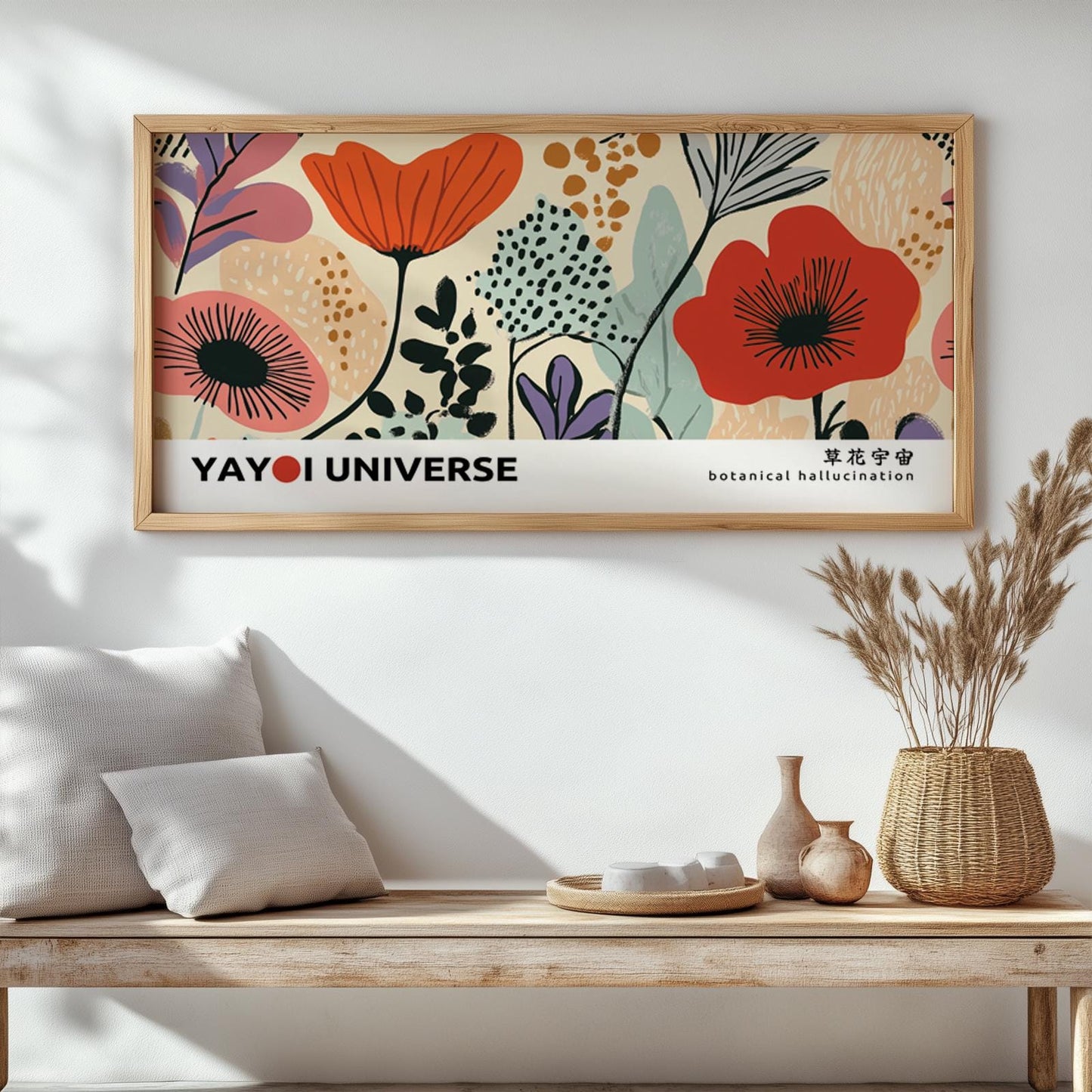 Colorful abstract floral print in a natural wood frame, displayed above a bench in sunlight