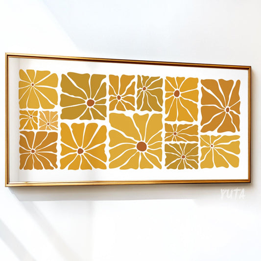 Geometric mid-century floral print in ochre and mustard, framed above a sofa.