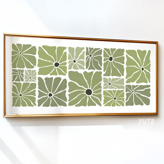 Framed olive green floral print in mid-century modern style above a white cabinet