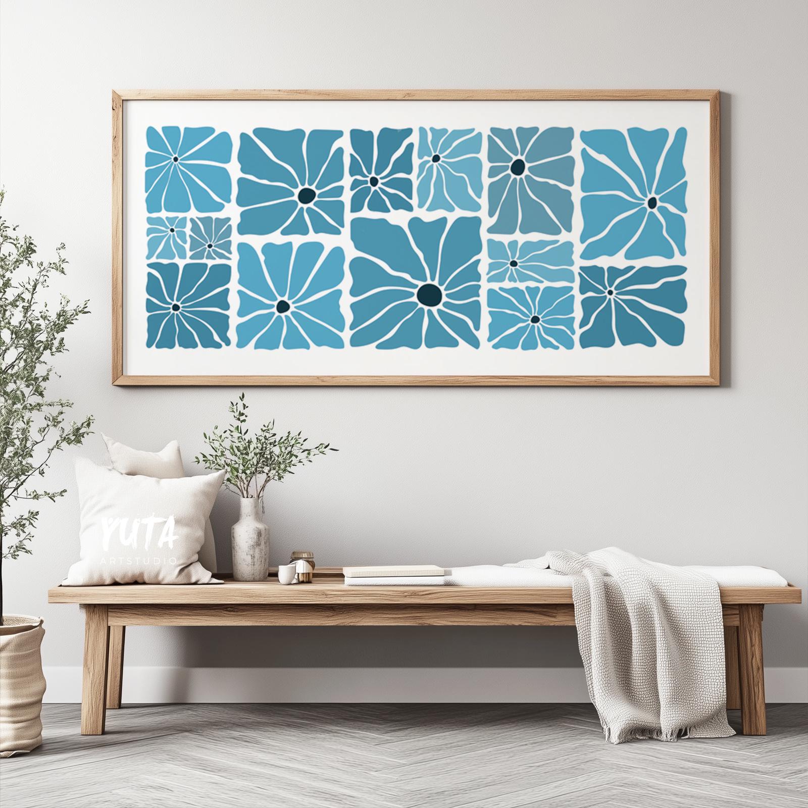Large framed botanical print with retro blue floral patterns above a wooden bench