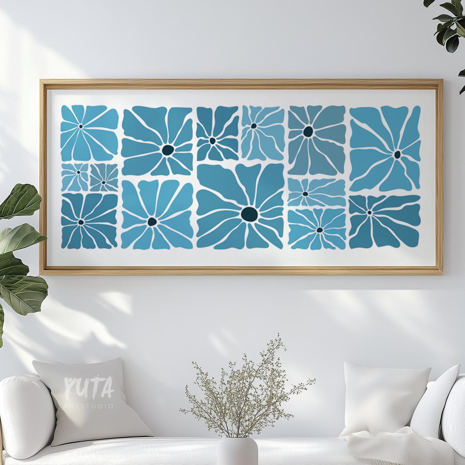 Framed blue retro botanical print displayed above seating, ready for secure shipping.