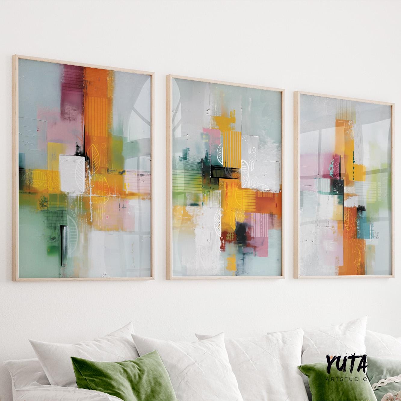 Contemporary abstract triptych featuring warm orange, green and pastel tones