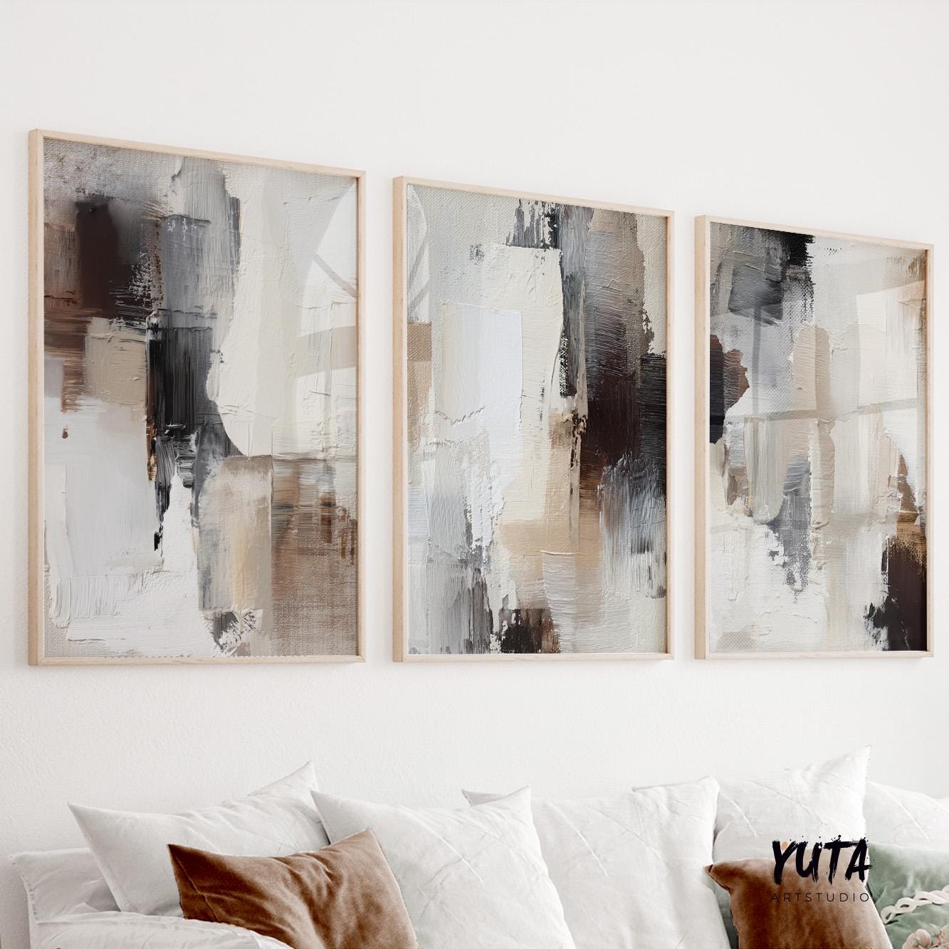 Neutral abstract painting with layered beige, white, and black textured brushstrokes.