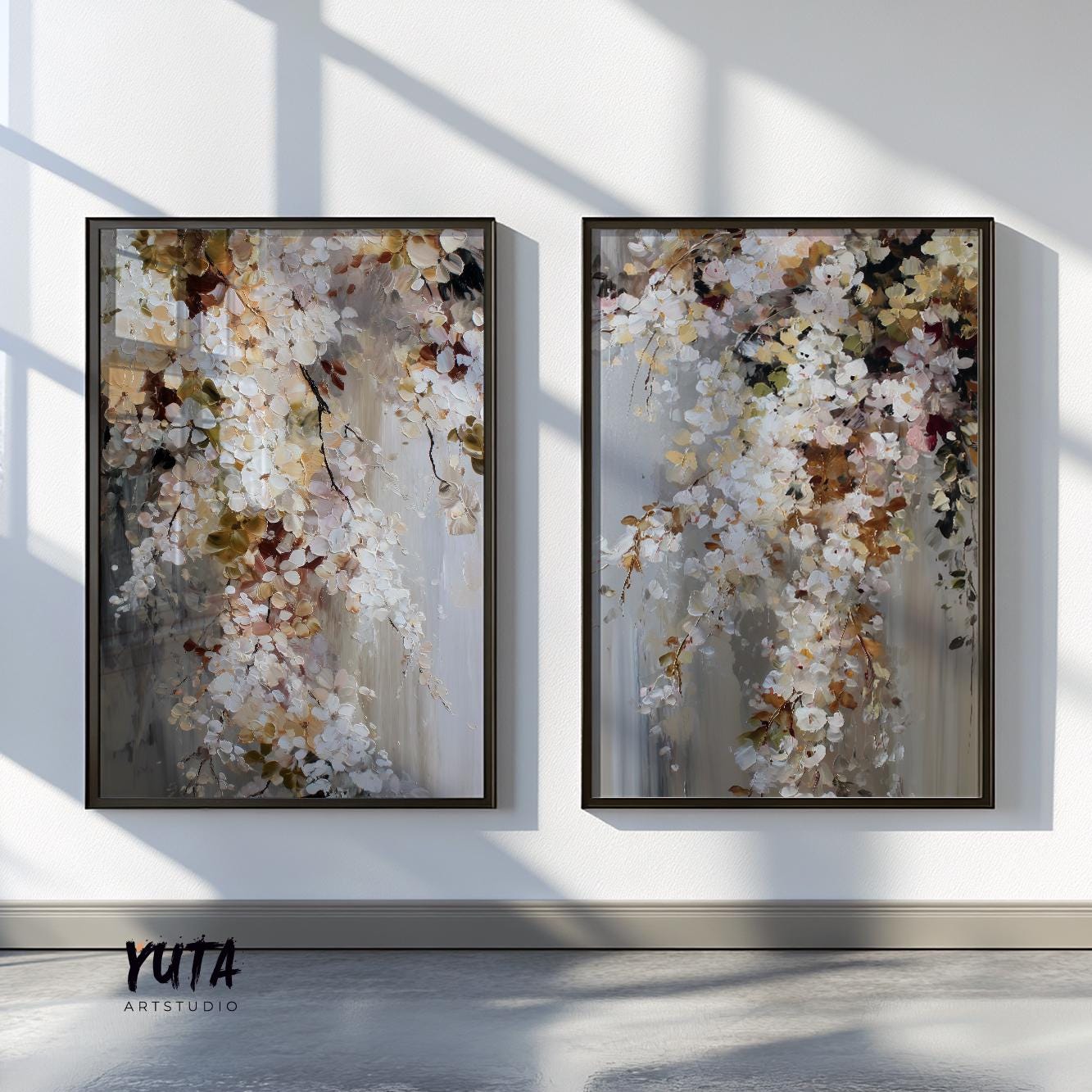 Pair of abstract floral paintings in dark frames displayed above a low sideboard