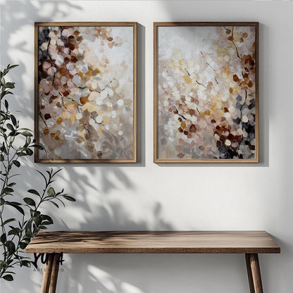Pair of framed abstract floral paintings with textured brushstrokes in soft daylight