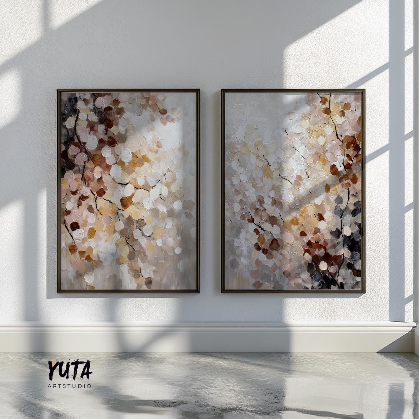 Two large abstract floral prints in matching frames, shown side by side on a sunlit wall for scale