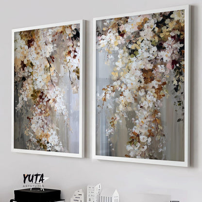Pair of framed abstract floral paintings with textured brushstrokes above a white console.