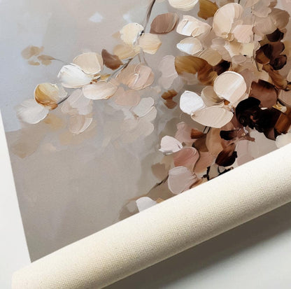 Textured brushstrokes of neutral floral art on unframed rolled canvas, close-up view