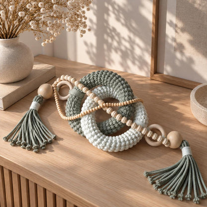 Custom color handmade table decoration with woven cotton rings, wood beads and tassels for modern neutral interiors
