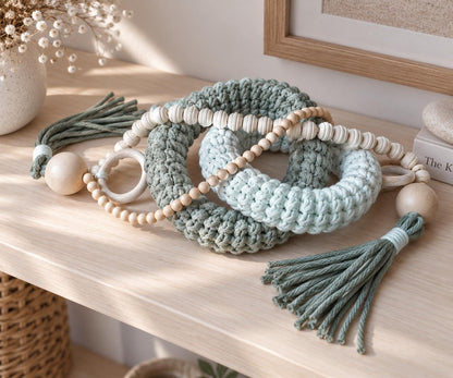 Scandinavian home decor with cotton cord rings and natural wooden beads styled on a console table