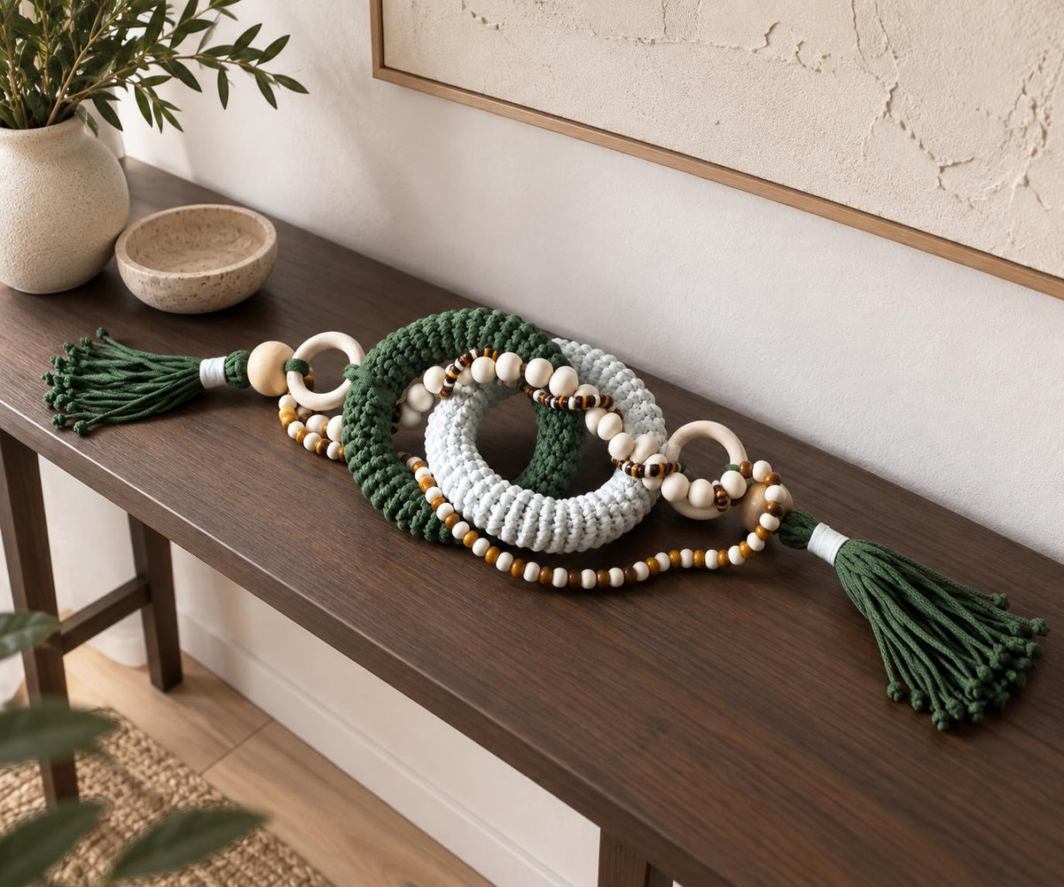Handmade organic modern table decor with olive green and cream woven cotton rings and natural wood accents