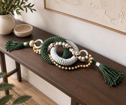 Handmade organic modern table decor with olive green and cream woven cotton rings and natural wood accents