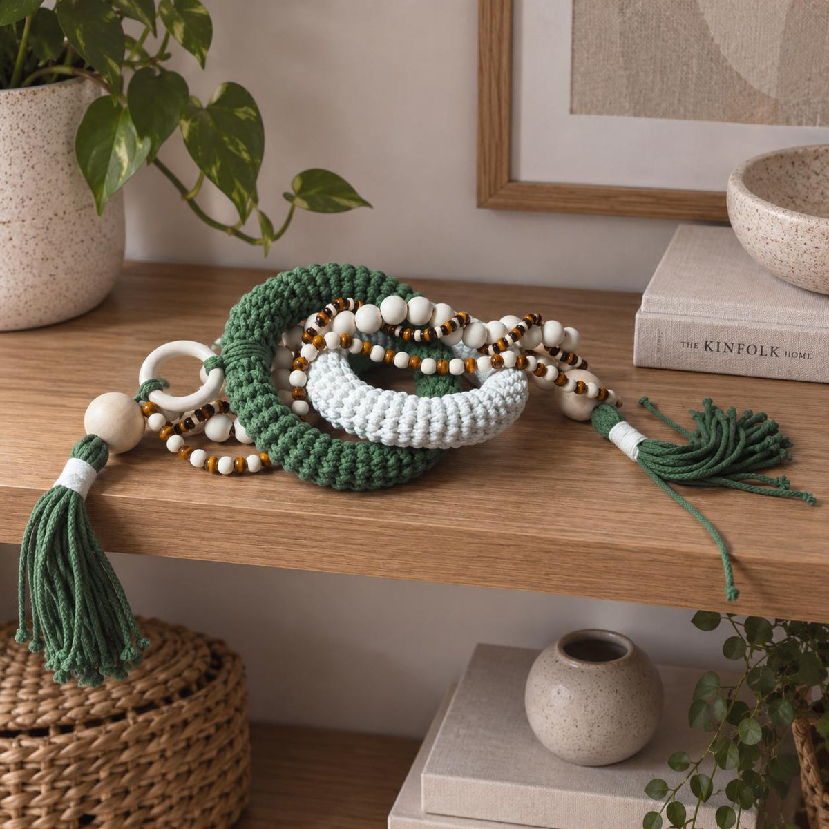 Green and cream decorative table object made from woven cotton cord and unfinished natural wood