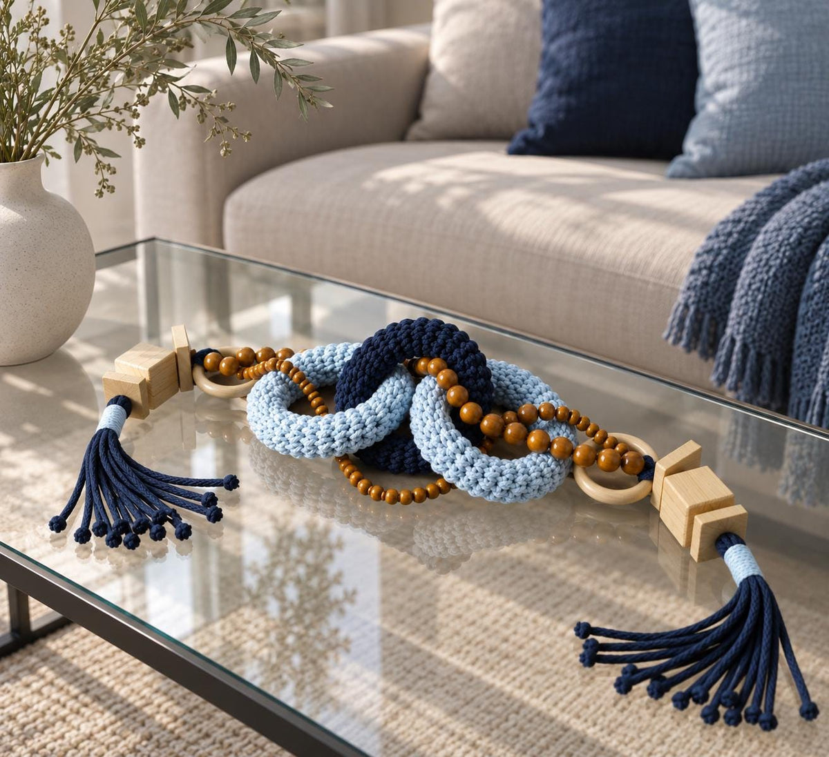 Handmade blue tabletop decor featuring woven cotton links and wood beads