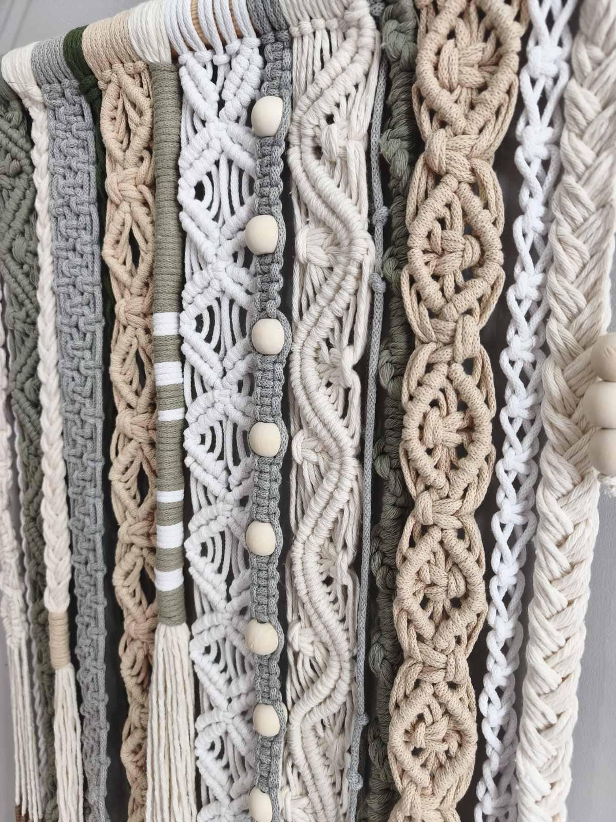 Close up of sage green beige cream and gray macrame weaving with intricate knot details