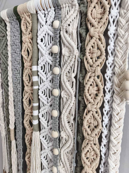 Close up of sage green beige cream and gray macrame weaving with intricate knot details