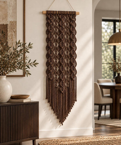Modern boho wall decor featuring macrame and pointed fringe silhouette