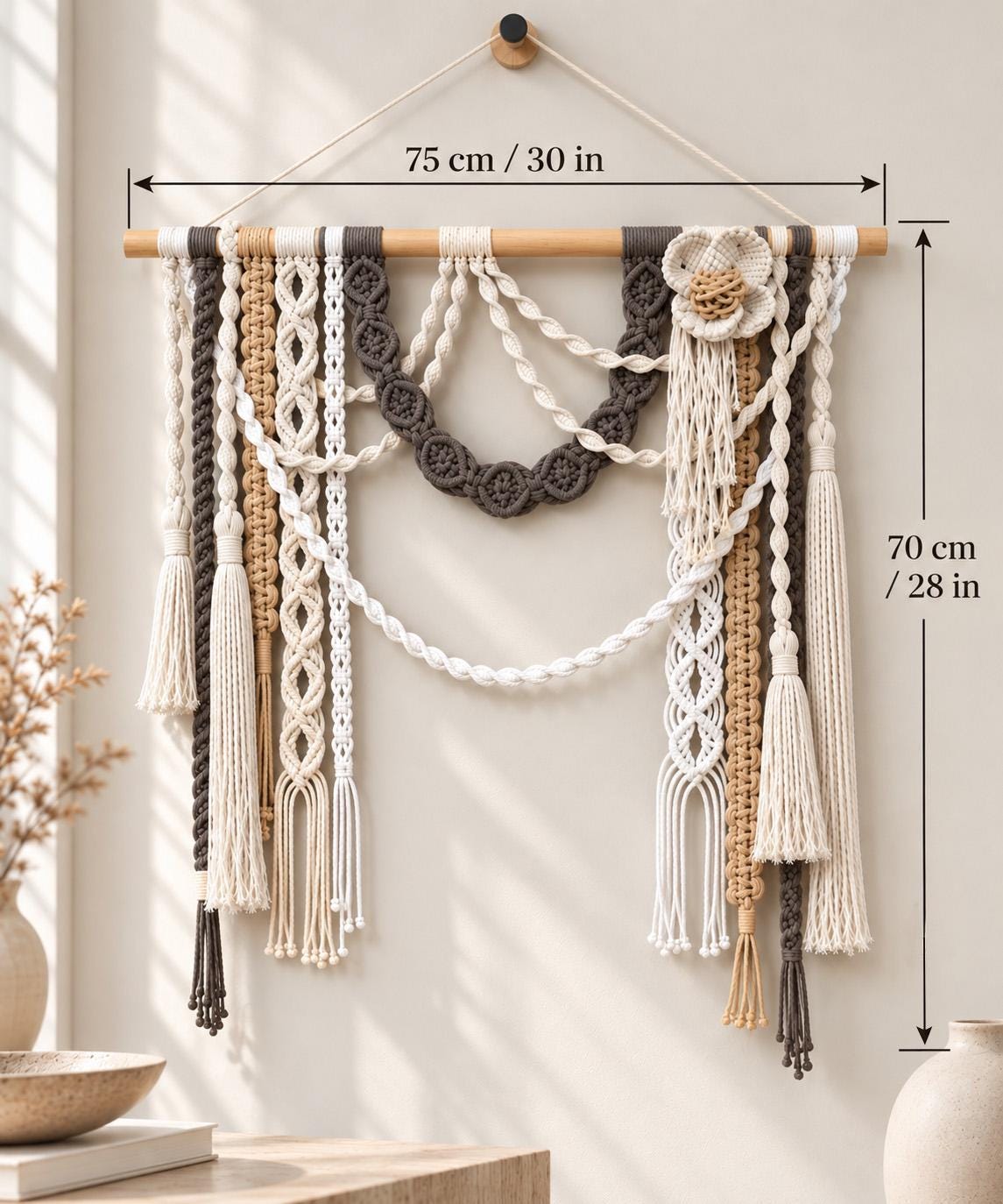Open center macrame wall hanging with asymmetrical knots long tassels and dimensional flower