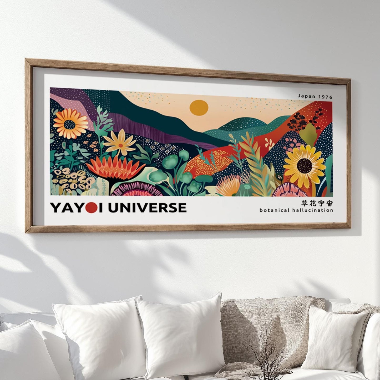 Framed colorful botanical landscape print with modern floral design hung above a white sofa