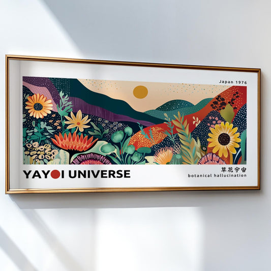Colorful abstract botanical landscape print in a gold frame hung above a light sofa.