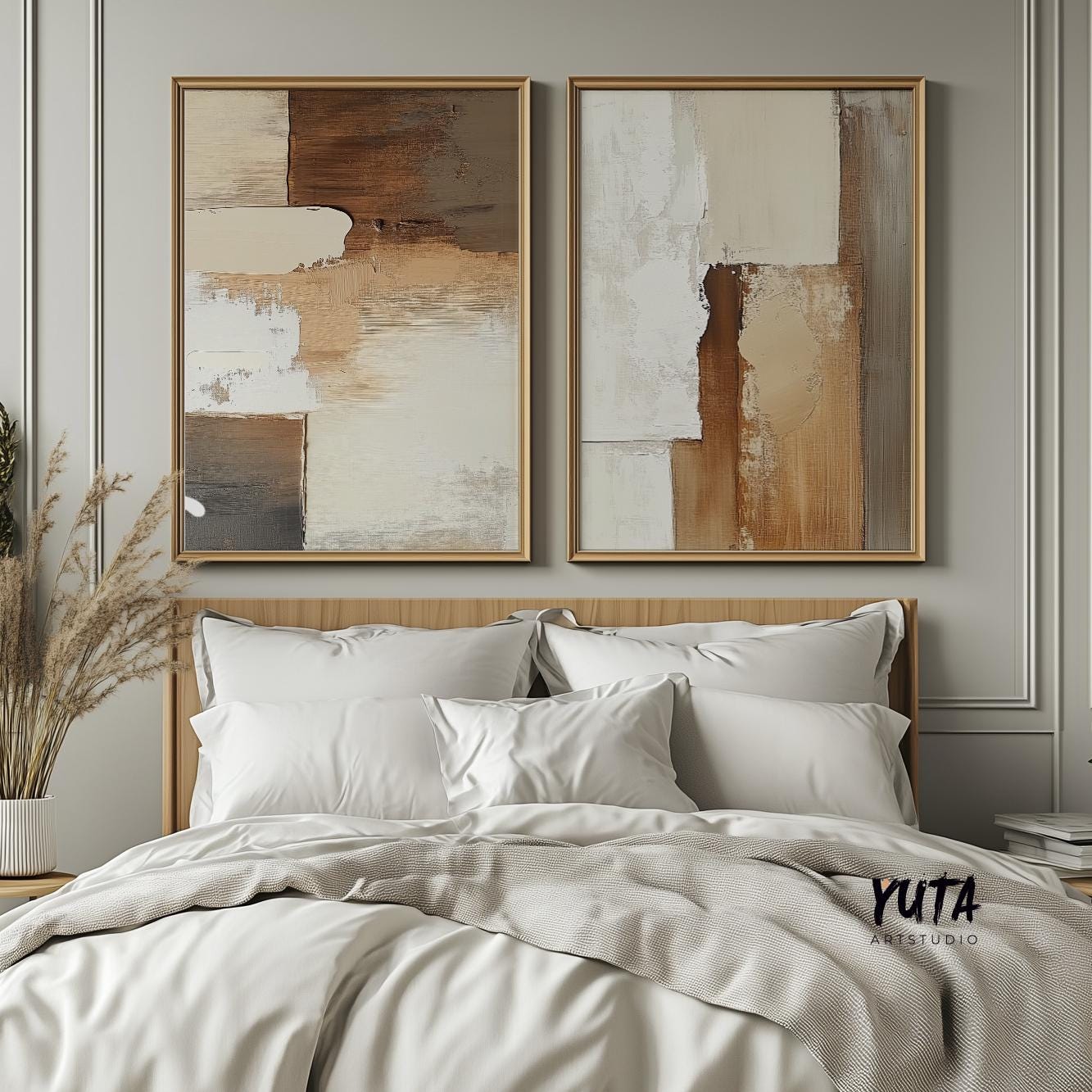 Two minimalist abstract prints in beige and brown tones, framed above a bed.