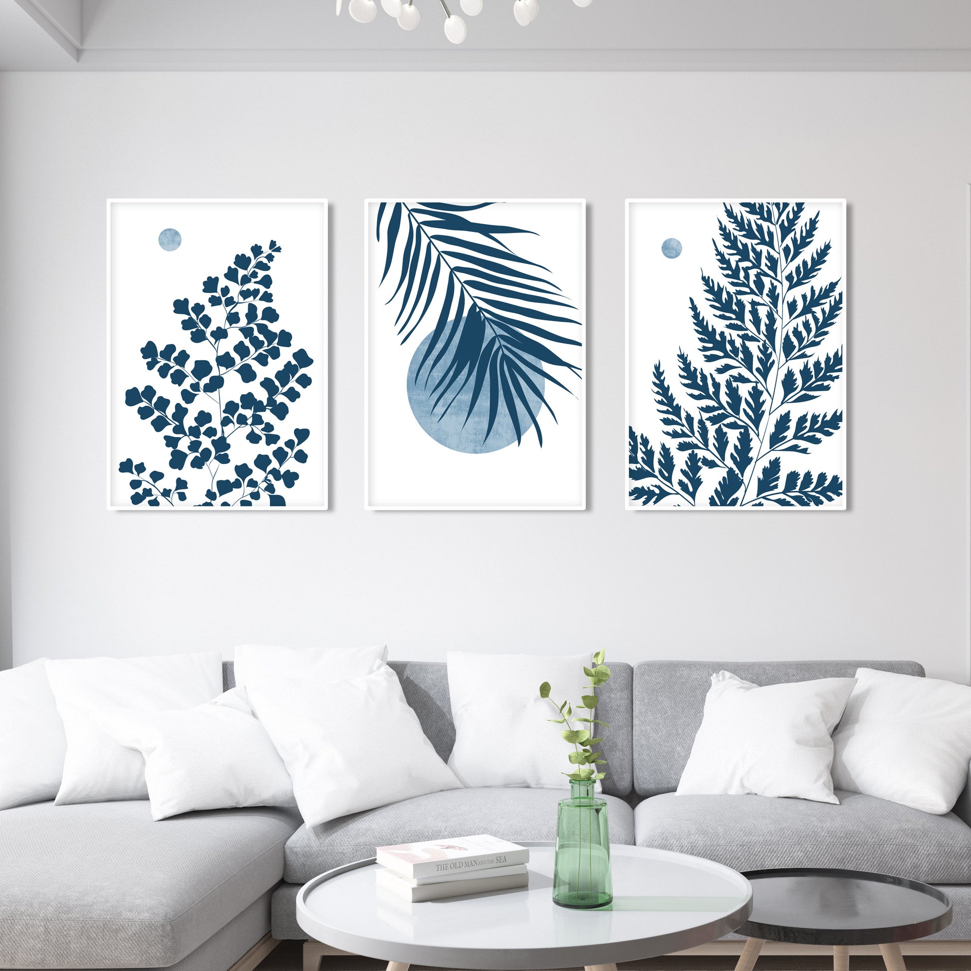 Large botanical wall art showcasing blue palm leaves, fern branches and tropical foliage artwork