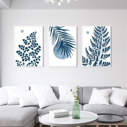 Large botanical wall art showcasing blue palm leaves, fern branches and tropical foliage artwork