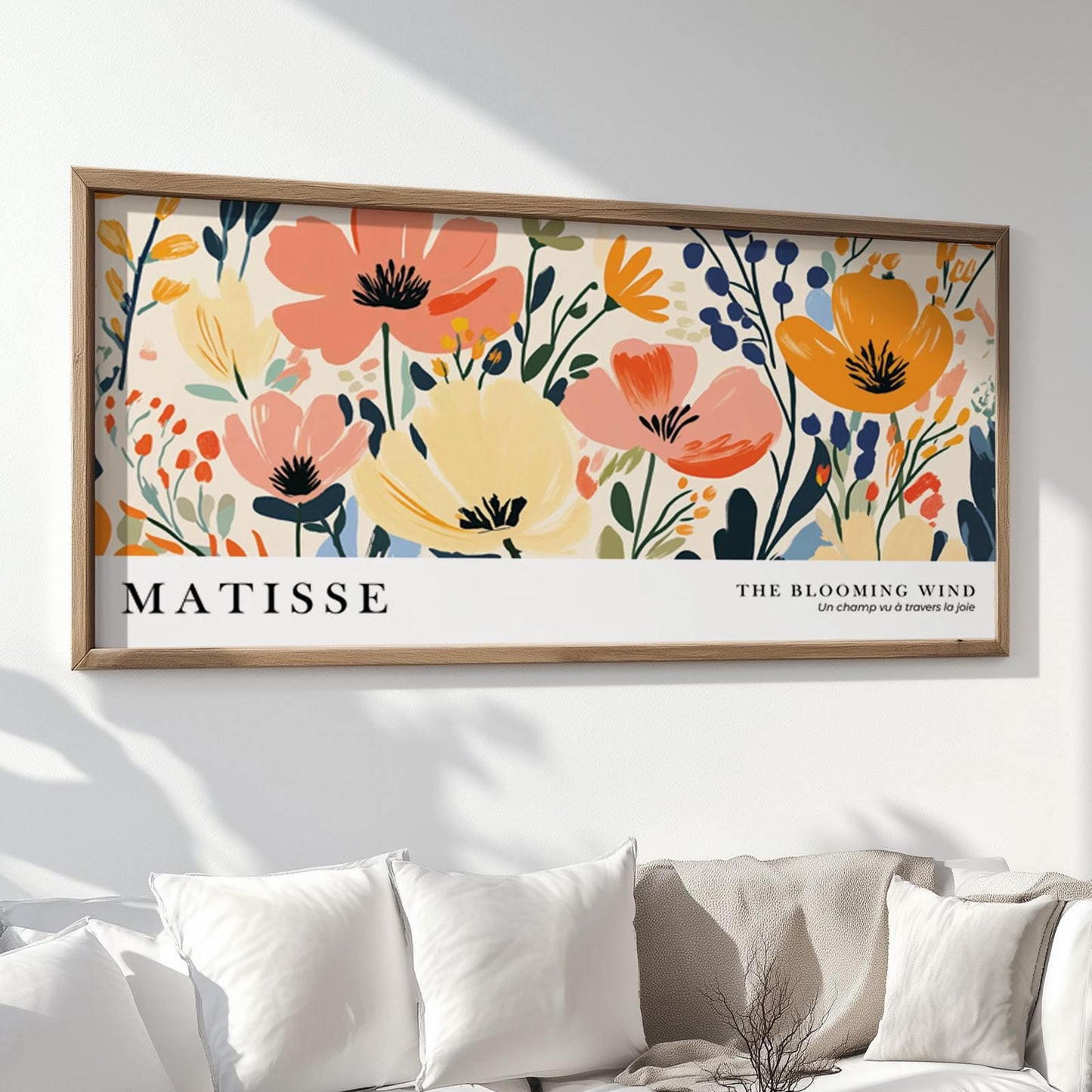 Oversized Matisse-inspired floral artwork with bold botanical shapes in a wood frame above a sofa