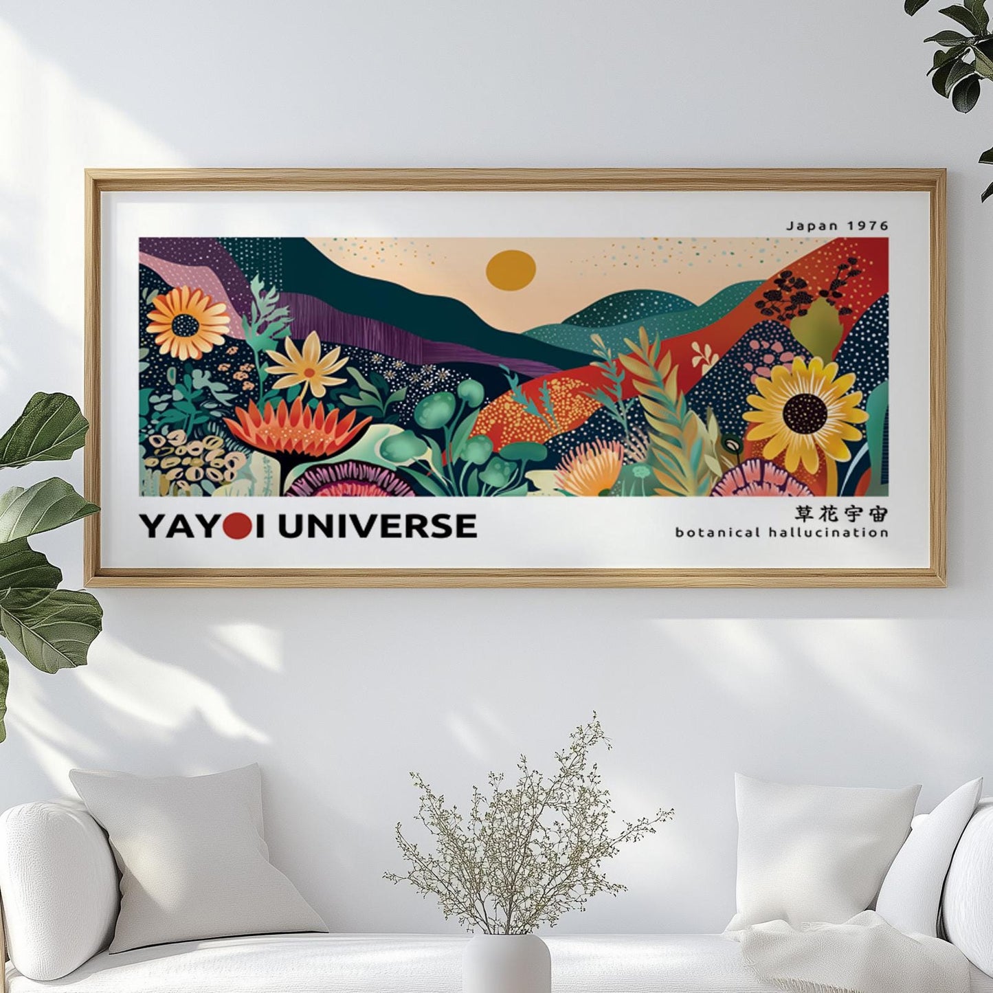 Colorful botanical landscape artwork in a light wood frame, centered above a white sofa