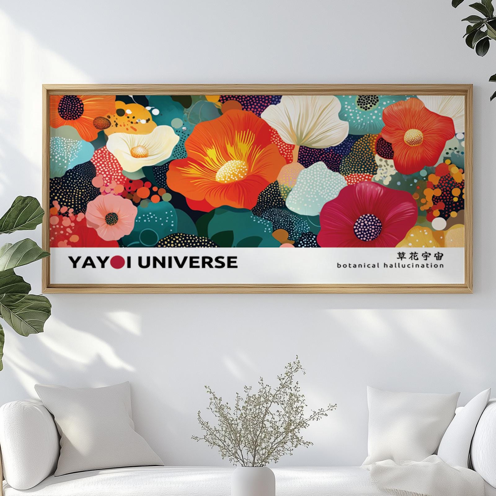 Bright abstract floral print in a light wood frame, wall-mounted above a white sofa.