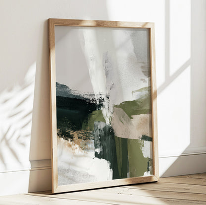 Minimalist abstract wall art set with organic green, beige, gray and white painted shapes in light wood frames.